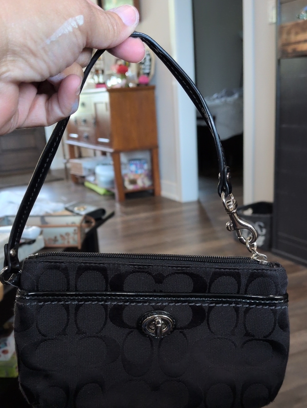 Coach Signature Turn-Lock Wristlet
